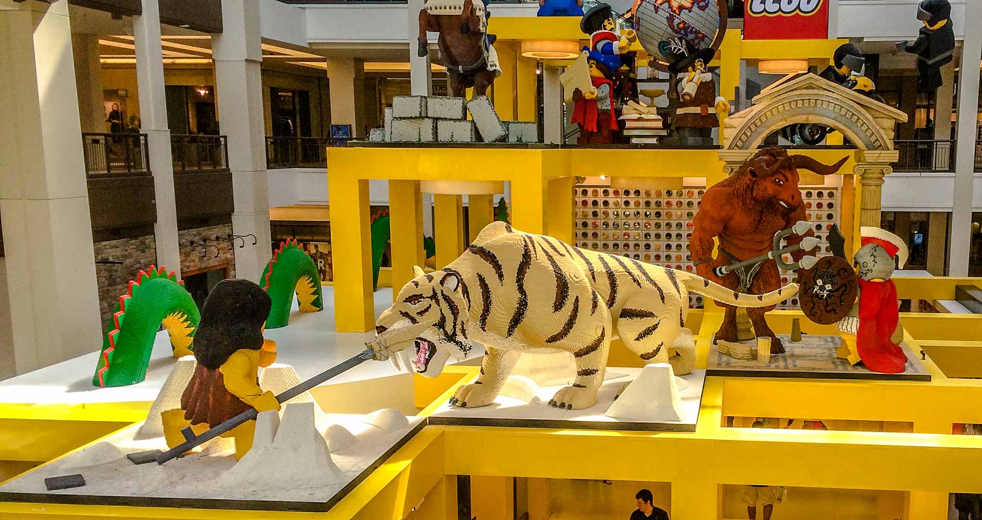 LEGO saber-tooth tiger scene at the Mall of America — prehistoric chaos in brick form